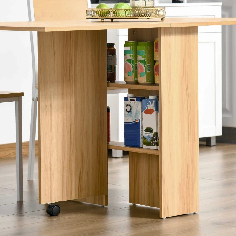 HOMCOM Drop Leaf Dining Table with Storage Shelves, Folding Kitchen Table, Writing Desk with 2 Wheels, Brown