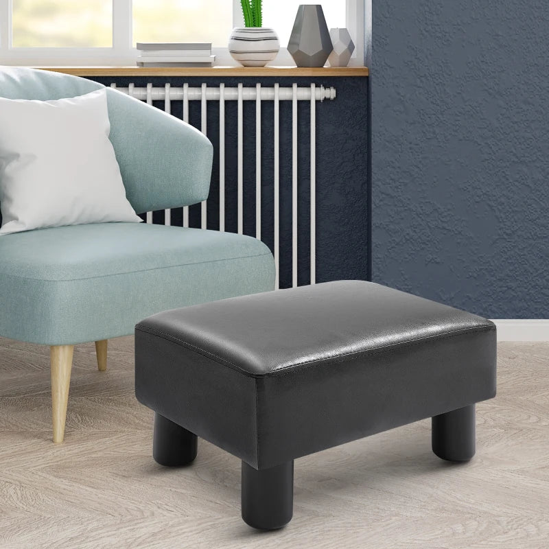 HOMCOM Ottoman Foot Rest, Small Foot Stool with Faux Leather Upholstery, Rectangular Ottoman Footrest with Padded Foam Seat and Plastic Legs, Bright Black