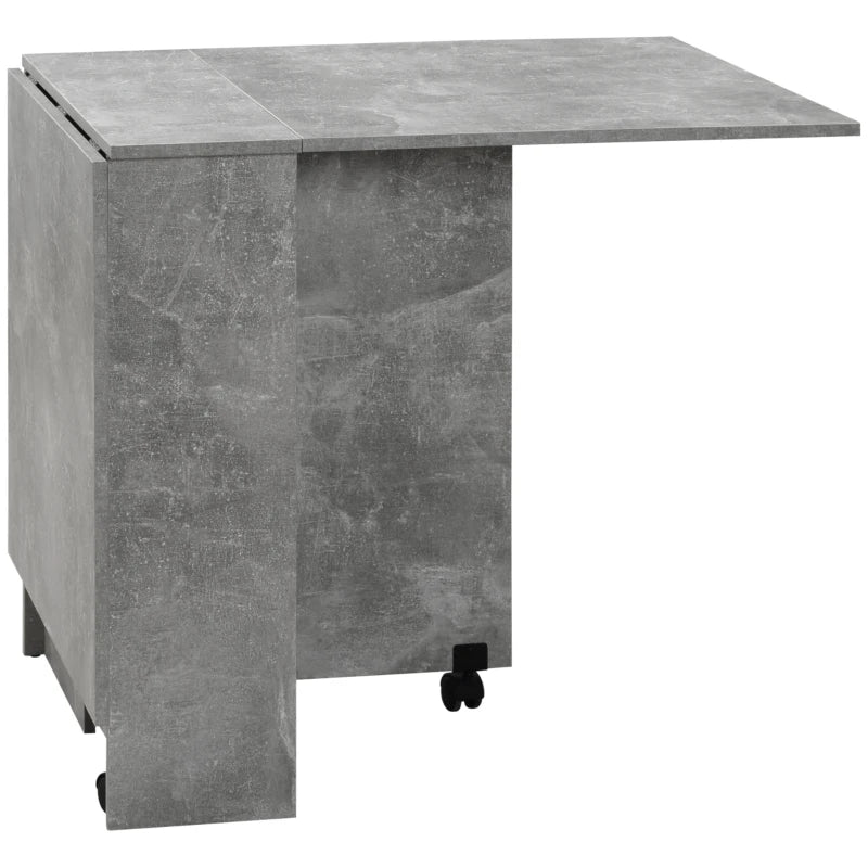 HOMCOM Folding Dining Table, Drop Leaf Table for Small Spaces with 2-tier Shelves, Small Kitchen Table with Rolling Casters, Cement Grey